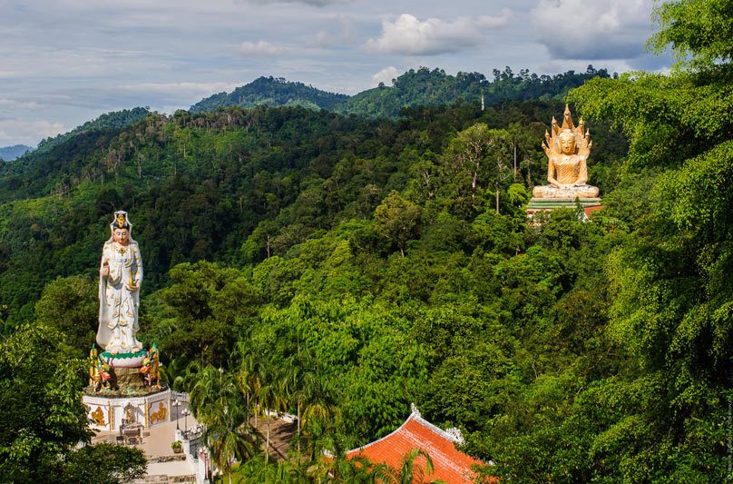 Wat Bang Raing's golden Buddha and Goddess of Mercy statues atop Khao Lan Mountain