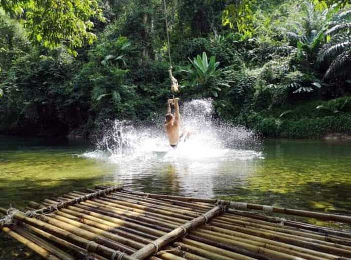 Rope swing over the river during the Khao Lak Chill Day tour