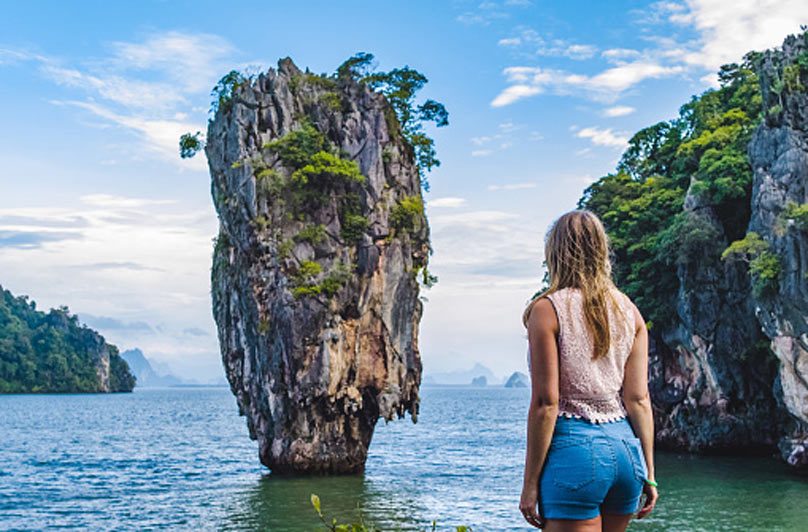 A guest looking out at James Bond Island (Koh Tapu) in Phang Nga Bay